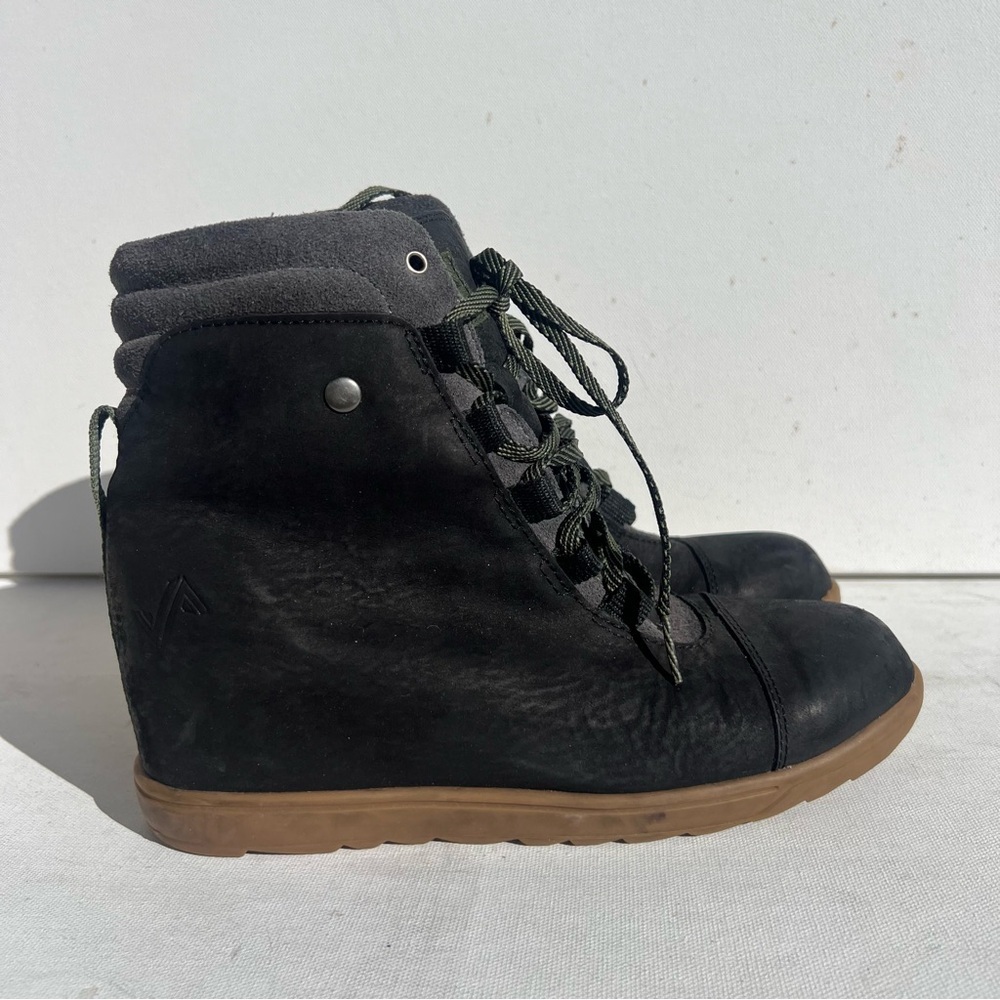 Stylish Black Ankle Boots with Brown Sole